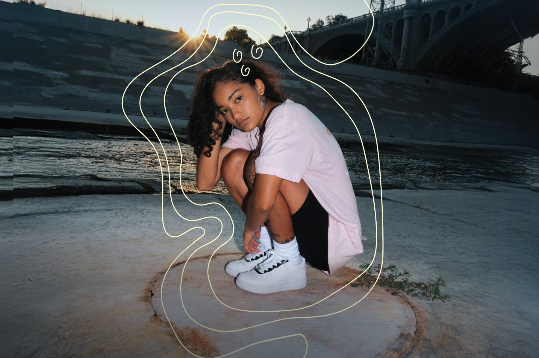 Émolab graphic featuring a crouching person surrounded by white contour lines, with the French tagline “la science des émotions liées aux changements climatiques” (the science of emotions related to climate change).